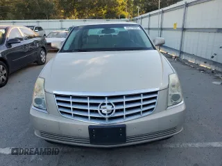2007 Cadillac DTS V8 z VIN 1G6KD57Y77U125427, wystawiony jako Copart lot #82278094 z przebiegiem 117 812 mil mil oraz Czysty tytuł • Clean title. Historia ofert i sprzedaży dostępna na DreamBid. Obrazek 5.