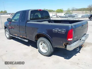 2000 Ford F-150 XL with VIN 1FTRX18LXYNB41132, listed as a IAAI auction lot 42173717 with Not provided miles and . Bid and sale history available at DreamBid. Image 3.