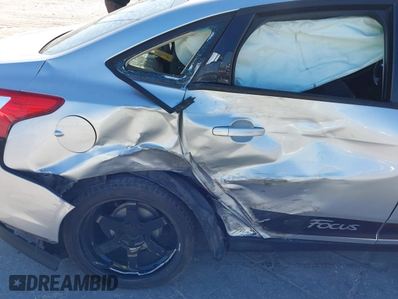 2012 Ford Focus SE with VIN 1FAHP3F23CL265724, listed as a IAAI auction lot 41184121 with 216,873 mi miles. Bid and sale history available at carsss.com. Image 6.