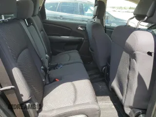 2013 Dodge Journey SE z VIN 3C4PDCAB3DT505527, wystawiony jako Copart lot #56102425 z przebiegiem 217 130 mil mil oraz Szkoda całkowita • Salvage title. Historia ofert i sprzedaży dostępna na DreamBid. Obrazek 11.