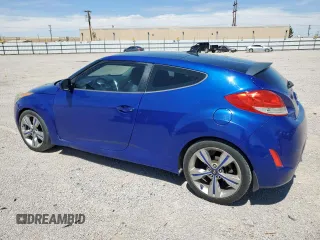 2013 Hyundai Veloster w/Red Int with VIN KMHTC6AD2DU150842, listed as a Copart auction lot 66378455 with 119,901 mi miles and Clean title. Bid and sale history available at DreamBid. Image 2.