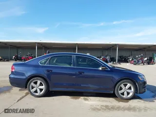 2012 Volkswagen Passat SE w/Sunroof with VIN 1VWBH7A35CC077207, listed as a IAAI auction lot 41351317 with 136,904 mi miles. Bid and sale history available at carsss.com. Image 13.