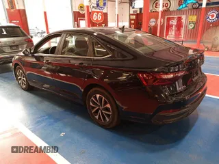 2024 Volkswagen Jetta S z VIN 3VW5M7BU1RM076143, wystawiony jako IAAI lot #42786512 z przebiegiem 30 201 mil mil oraz . Historia ofert i sprzedaży dostępna na DreamBid. Obrazek 27.