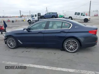 2019 BMW 5 Series 530e with VIN WBAJA9C56KB388241, listed as a IAAI auction lot 42181217 with 69,805 mi miles and . Bid and sale history available at carsss.com. Image 15.