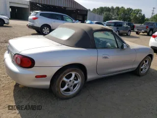 2001 Mazda MX-5 Miata with VIN JM1NB353510205710, listed as a Copart auction lot 59623015 with Not provided miles and Clean title. Bid and sale history available at DreamBid. Image 3.