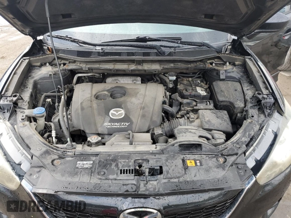 2014 Mazda CX-5 Touring with VIN JM3KE2CY8E0424757, listed as a Copart auction lot 54703195 with 111,401 mi miles and Salvage Title. Bid and sale history available at DreamBid. Image 12.