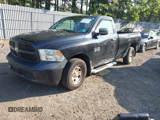 2014 Ram 1500 Tradesman z VIN 3C6JR7DG4EG324833, wystawiony jako IAAI lot #42876061 z przebiegiem 125 285 mil mil oraz . Historia ofert i sprzedaży dostępna na DreamBid. Obrazek 2.