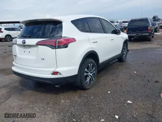2018 Toyota RAV4 LE with VIN JTMZFREV9JJ192075, listed as a IAAI auction lot 41860513 with 64,586 mi miles. Bid and sale history available at carsss.com. Image 4.