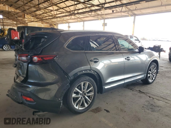 2016 Mazda CX-9 Grand Touring с VIN JM3TCADY3G0119947, выставлен на аукционе Copart как лот 57904515 с пробегом 94 251 миль миль и Списание • Salvage title. История ставок и продаж доступна на DreamBid. Изображение 3.
