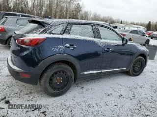2018 Mazda CX-3 Grand Touring z VIN JM1DKFD73J0309811, wystawiony jako Copart lot #50003315 z przebiegiem 135 365 mil mil oraz Czysty tytuł • Clean title. Historia ofert i sprzedaży dostępna na DreamBid. Obrazek 3.