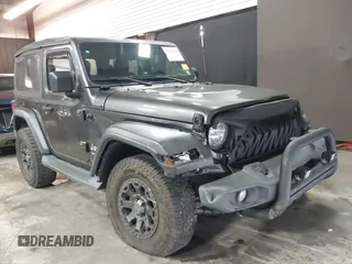 2021 Jeep Wrangler Sport S with VIN 1C4HJXAG2MW502452, listed as a IAAI auction lot 42031159 with 87,952 mi miles and . Bid and sale history available at DreamBid. Image 6.