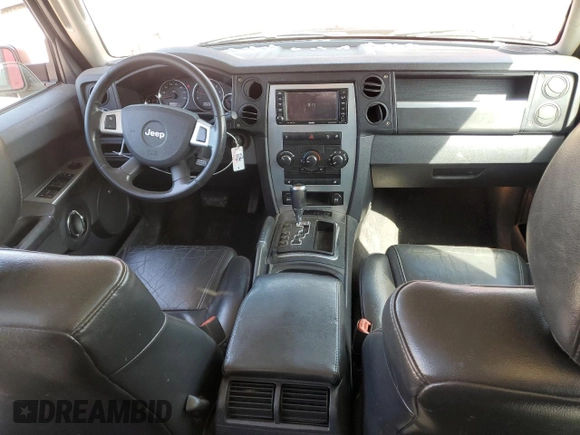 2010 Jeep Commander Sport z VIN 1J4RG4GK0AC156826, wystawiony jako Copart lot #50707345 z przebiegiem 213 694 mil mil oraz Szkoda całkowita • Salvage title. Historia ofert i sprzedaży dostępna na DreamBid. Obrazek 8.