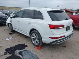 2021 Audi Q7 Premium Plus with VIN WA1LXAF71MD013285, listed as a IAAI auction lot 41962332 with 81,746 mi miles and . Bid and sale history available at DreamBid. Image 3.