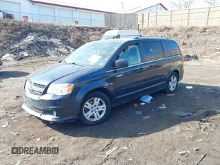 2013 Dodge Grand Caravan Crew with VIN 2C4RDGDG8DR795483, listed as a IAAI auction lot 41781570 with 188,098 mi miles and . Bid and sale history available at DreamBid. Image 2.