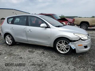 2009 Hyundai Elantra Touring z VIN KMHDC86E29U038194, wystawiony jako Copart lot #57483375 z przebiegiem 218 337 mil mil oraz Szkoda całkowita • Salvage title. Historia ofert i sprzedaży dostępna na DreamBid. Obrazek 4.
