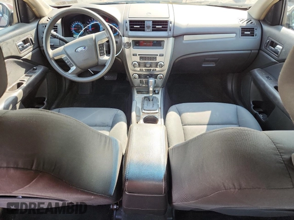 2012 Ford Fusion SE z VIN 3FAHP0HA7CR387524, wystawiony jako Copart lot #62083235 z przebiegiem 104 698 mil mil oraz Szkoda całkowita • Salvage title. Historia ofert i sprzedaży dostępna na DreamBid. Obrazek 8.
