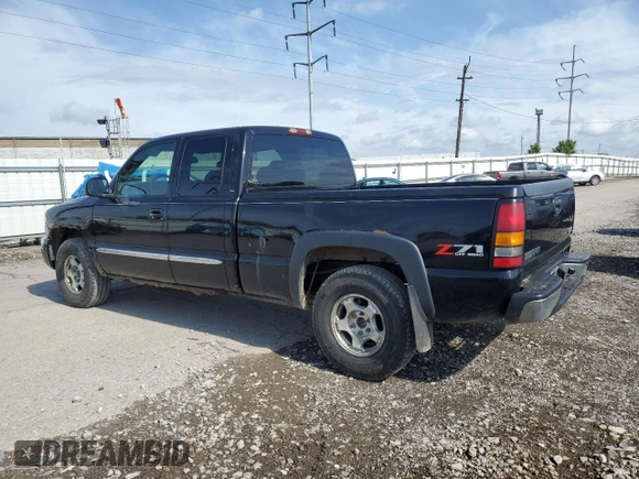 2004 GMC Sierra 1500 SLE with VIN 1GTEK19T54E305571, listed as a Copart auction lot 56954375 with 174,649 mi miles and Salvage title. Bid and sale history available at DreamBid. Image 2.