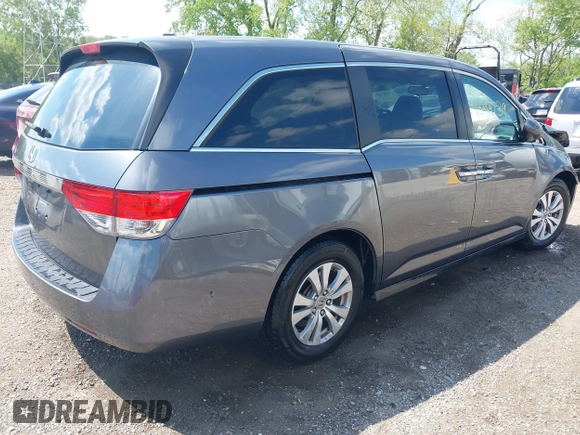 2014 Honda Odyssey EX-L with VIN 5FNRL5H60EB117218, listed as a IAAI auction lot 42201739 with 184,586 mi miles and . Bid and sale history available at DreamBid. Image 4.