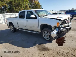 2011 GMC Sierra 2500HD SLT с VIN 1GT121C8XBF145553, выставлен на аукционе Copart как лот 77220804 с пробегом 414 257 миль миль и Списание • Salvage title. История ставок и продаж доступна на DreamBid. Изображение 4.