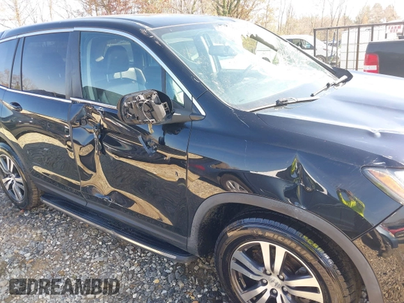 2018 Honda Pilot EX-L with VIN 5FNYF6H59JB062326, listed as a IAAI auction lot 40662881 with 77,573 mi miles and . Bid and sale history available at DreamBid. Image 13.