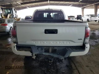 2021 Toyota Tacoma 4WD SR5 with VIN 3TMDZ5BN4MM106693, listed as a Copart auction lot 45278655 with 52,510 mi miles and Salvage Title. Bid and sale history available at carsss.com. Image 6.