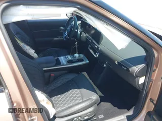 2023 Genesis GV60 Performance z VIN KMUKEDTB2PU008745, wystawiony jako IAAI lot #42444127 z przebiegiem 12 138 mil mil oraz . Historia ofert i sprzedaży dostępna na DreamBid. Obrazek 5.