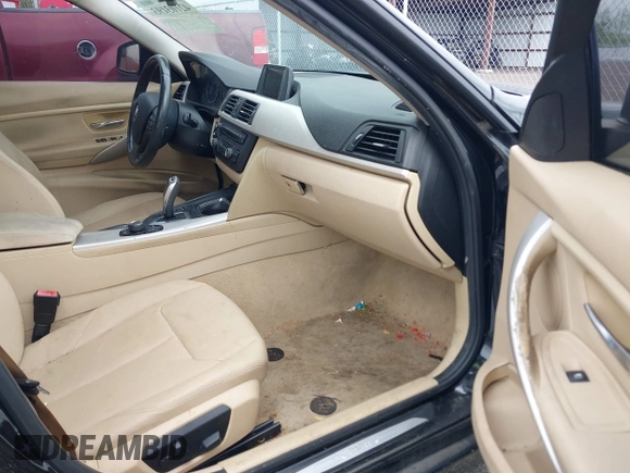 2015 BMW 3 Series 320i with VIN WBA3B1G57FNT05826, listed as a IAAI auction lot 42103193 with 128,800 mi miles. Bid and sale history available at carsss.com. Image 5.