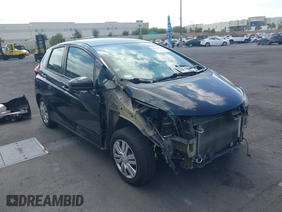 2015 Honda Fit LX z VIN 3HGGK5H52FM765921, wystawiony jako IAAI lot #42135740 z przebiegiem 82 647 mil mil oraz . Historia ofert i sprzedaży dostępna na DreamBid. Obrazek 14.