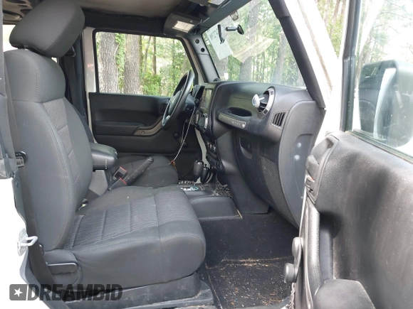 2012 Jeep Wrangler Sport with VIN 1C4AJWAG7CL192200, listed as a IAAI auction lot 42472398 with 198,999 mi miles and . Bid and sale history available at DreamBid. Image 5.