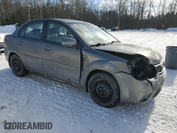 2011 Kia Rio with VIN KNADH4B32B6915325, listed as a Copart auction lot 86824074 with 167,410 mi miles and Salvage Title. Bid and sale history available at DreamBid. Image 4.