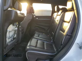 2019 Jeep Grand Cherokee Overland with VIN 1C4RJFCG4KC815786, listed as a Copart auction lot 49697865 with 171,655 mi miles and Salvage Title. Bid and sale history available at carsss.com. Image 12.