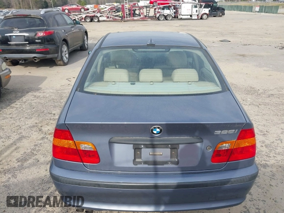 2005 BMW 3 Series 325i with VIN WBAET37445NJ85538, listed as a IAAI auction lot 41872686 with 121,237 mi miles. Bid and sale history available at carsss.com. Image 14.