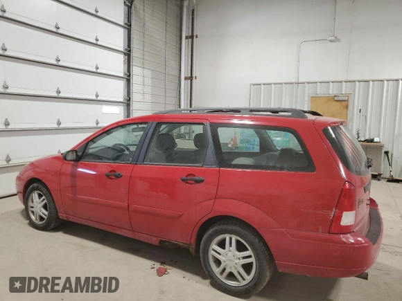 2001 Ford Focus SE with VIN 1FAFP36321W214680, listed as a Copart auction lot 43692915 with 157,811 mi miles and Salvage Title. Bid and sale history available at carsss.com. Image 2.