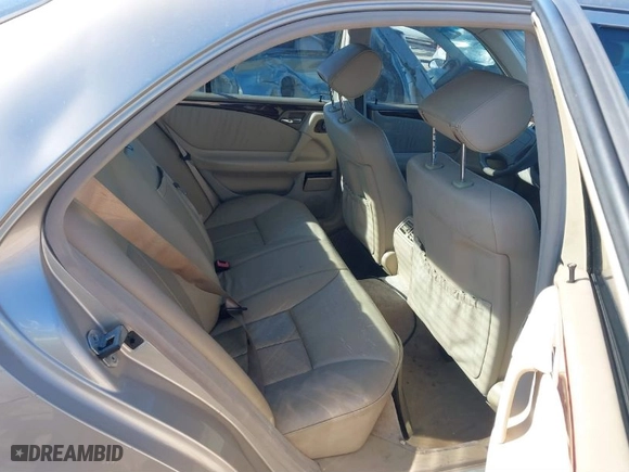 1999 Mercedes-Benz E-Class with VIN WDBJF65H3XA764352, listed as a IAAI auction lot 41646943 with 179,419 mi miles. Bid and sale history available at carsss.com. Image 8.