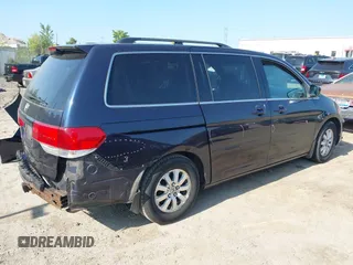 2008 Honda Odyssey EX with VIN 5FNRL38478B078862, listed as a IAAI auction lot 40090252 with 184,583 mi miles. Bid and sale history available at carsss.com. Image 4.