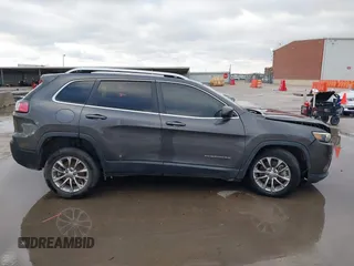 2019 Jeep Cherokee Latitude Plus z VIN 1C4PJLLX1KD241874, wystawiony jako IAAI lot #41313447 z przebiegiem 108 649 mil mil oraz . Historia ofert i sprzedaży dostępna na DreamBid. Obrazek 13.