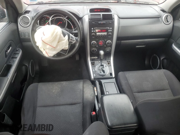 2008 Suzuki Grand Vitara w/Spare & Cargo Covers z VIN JS3TD941084100467, wystawiony jako Copart lot #85230824 z przebiegiem 143 267 mil mil oraz Szkoda całkowita • Salvage title. Historia ofert i sprzedaży dostępna na DreamBid. Obrazek 8.