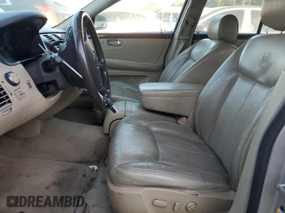 2007 Cadillac DTS V8 z VIN 1G6KD57Y77U125427, wystawiony jako Copart lot #82278094 z przebiegiem 117 812 mil mil oraz Czysty tytuł • Clean title. Historia ofert i sprzedaży dostępna na DreamBid. Obrazek 7.