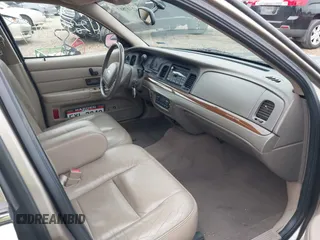 2004 Ford Crown Victoria LX с VIN 2FAFP74W74X114961, выставлен на аукционе IAAI как лот 42347867 с пробегом 170 867 миль миль и . История ставок и продаж доступна на DreamBid. Изображение 5.
