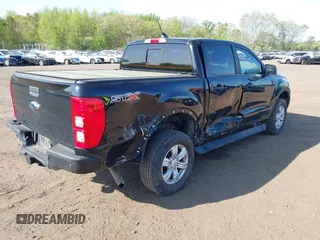 2021 Ford Ranger XL with VIN 1FTER4FHXMLD50868, listed as a IAAI auction lot 42128556 with 99,164 mi miles and . Bid and sale history available at DreamBid. Image 4.