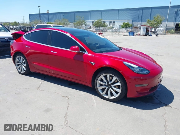 2018 Tesla Model 3 Long Range Battery z VIN 5YJ3E1EAXJF048839, wystawiony jako IAAI lot #42328412 z przebiegiem 83 083 mil mil oraz . Historia ofert i sprzedaży dostępna na DreamBid. Obrazek 1.