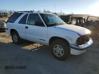 2000 Chevrolet Blazer LS with VIN 1GNCT18W8YK285881, listed as a Copart auction lot 41364325 with 277,029 mi miles and Salvage title. Bid and sale history available at DreamBid. Image 4.