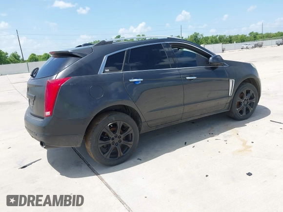 2015 Cadillac SRX Performance Collection with VIN 3GYFNCE31FS605298, listed as a IAAI auction lot 42859993 with 99,192 mi miles and . Bid and sale history available at DreamBid. Image 4.