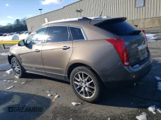 2014 Cadillac SRX Premium Collection z VIN 3GYFNGE37ES566089, wystawiony jako Copart lot #83595454 z przebiegiem 209 155 mil mil oraz Szkody całkowita. Historia ofert i sprzedaży dostępna na DreamBid. Obrazek 2.