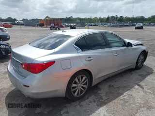 2014 Infiniti Q50 Premium z VIN JN1BV7AP9EM690381, wystawiony jako IAAI lot #41761562 z przebiegiem 107 099 mil mil oraz . Historia ofert i sprzedaży dostępna na DreamBid. Obrazek 4.