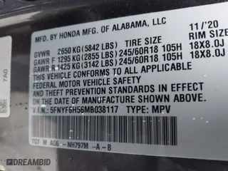 2021 Honda Pilot EX-L with VIN 5FNYF6H56MB038117, listed as a IAAI auction lot 41105707 with 95,613 mi miles. Bid and sale history available at carsss.com. Image 9.
