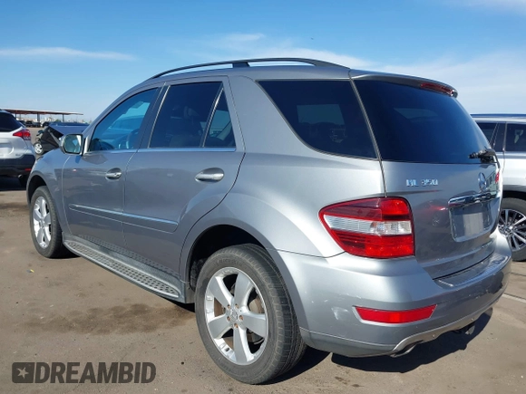 2010 Mercedes-Benz M 350 with VIN 4JGBB5GB0AA570448, listed as a IAAI auction lot 41911210 with 166,489 mi miles and . Bid and sale history available at DreamBid. Image 3.