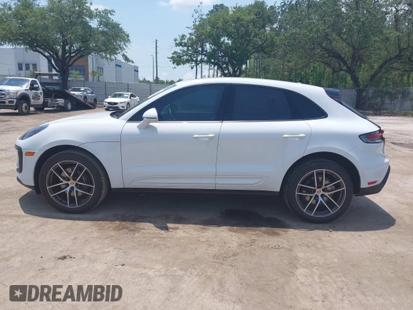 2023 Porsche Macan with VIN WP1AA2A55PLB11111, listed as a IAAI auction lot 42209465 with 25,612 mi miles and . Bid and sale history available at DreamBid. Image 14.