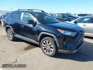 2019 Toyota RAV4 Limited with VIN JTMN1RFV5KD506624, listed as a IAAI auction lot 41657432 with 93,416 mi miles. Bid and sale history available at carsss.com. Image 1.