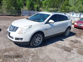 2013 Cadillac SRX Premium Collection with VIN 3GYFNEE33DS554556, listed as a IAAI auction lot 42152972 with 144,668 mi miles and . Bid and sale history available at DreamBid. Image 2.